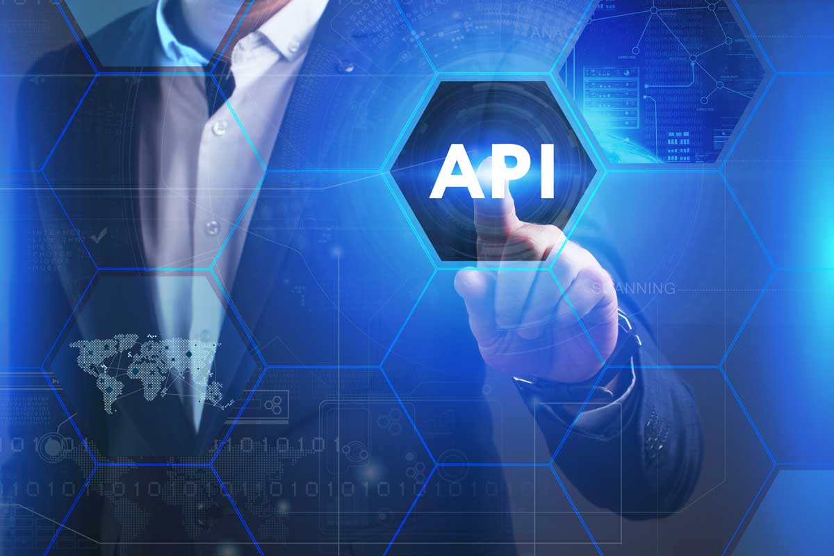 Abstract: Man pointing at the word API